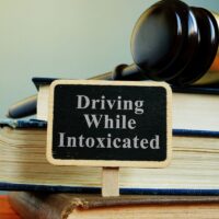 DWI driving while intoxicated law and books.